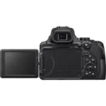 Back view of a digital camera with a flip-out screen, ideal for photography enthusiasts.
