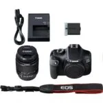 Canon EOS 4000D DSLR camera kit with 18-55mm lens, charger, battery, and strap.