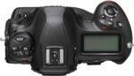 Top view of Nikon D6 DSLR camera body with control buttons and display screen.