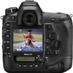 Nikon D6 DSLR camera body with rear display showing an athlete in action.