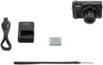 Canon Powershot G7 X Mark III camera with charger, battery, strap, and cable.