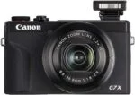 Canon Powershot G7 X Mark III digital camera with flash extended, ideal for photography enthusiasts.