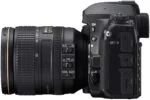 Side view of Nikon D780 camera with 24-120mm lens, featuring control buttons and lens details.