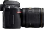 Nikon D780 DSLR camera with 24-120mm lens, side view.