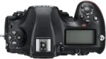 Top view of Nikon D850 DSLR camera body with control dials and LCD screen.