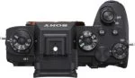 Top view of Sony Alpha 1 mirrorless camera body with control dials.