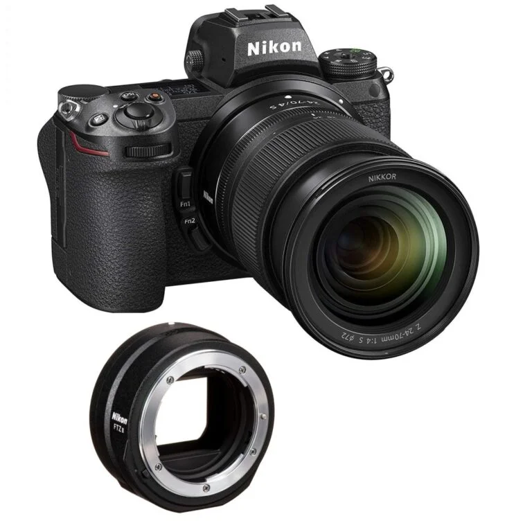 Nikon mirrorless camera with lens and adapter, available at Camix UK.