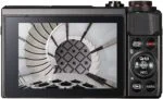 Canon PowerShot G7 X Mark II displaying spiral staircase on screen, compact digital camera.
