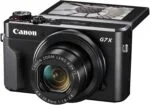 Canon PowerShot G7 X Mark II digital camera with flip-up screen.