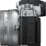 Nikon Z fc camera with Z 16-50mm lens, side view, available at Camix UK.