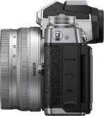 Nikon Z fc camera with Z 16-50mm lens, side view, available at Camix UK.