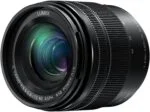 Panasonic Lumix 12-60mm F3.5-5.6 lens, ideal for versatile photography, available at Camix camera shop UK.