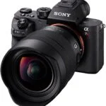 Sony camera with FE 12-24mm F4 G lens, ideal for wide-angle photography.