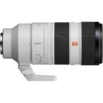 Sony telephoto zoom lens with tripod mount, ideal for professional photography.