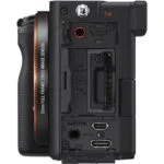 Side view of Sony A7C camera body showing ports and controls.