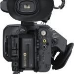 Sony PXW-Z150 4K XDCAM Camcorder with open side panel showing controls and ports.