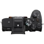 Top view of Sony A7 IV digital camera body with control dials.
