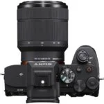 Sony A7 IV mirrorless camera with 28-70mm lens, top view, available at Camix UK.