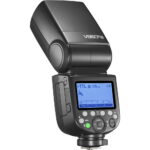 Professional camera flashgun with digital display for photography lighting.