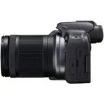 Canon EOS R10 mirrorless camera with 18-150mm lens, side view, available at Camix UK.