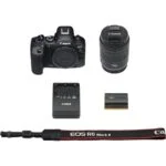 Canon EOS R6 Mark II with 24-105mm lens, battery, charger, and strap.