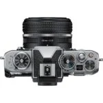 Top view of Nikon Z fc mirrorless camera with 28mm lens, showcasing dials and controls.