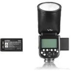 Godox V1 camera flash with battery, ideal for professional photography lighting.