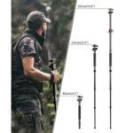 Man using a camera monopod in nature, showcasing adjustable height options.