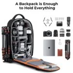 Photography backpack with cameras, lenses, drone, and accessories.