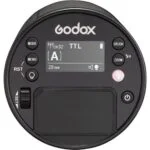 Godox camera flash control unit with digital display and buttons.