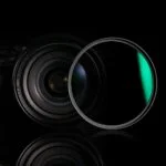 Close-up of a camera lens with a lens filter, photography gear from Camix UK.