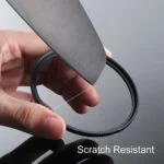 Scratch-resistant camera lens filter being tested with a knife.