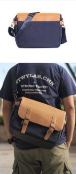Stylish camera bag with tan leather accents, ideal for carrying photography gear.