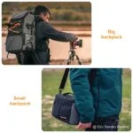 Photographer with large backpack setting up camera on tripod outdoors.