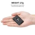 Compact camera accessory plate held in hand, lightweight at 27g.
