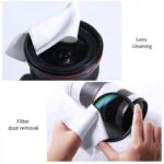 Camera lens cleaning and filter dust removal with cloth.