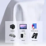 Photography and tech gear including camera, laptop, phone, glasses, watch, and binoculars.