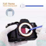 Full frame sensor cleaning swab used on a mirrorless camera body.