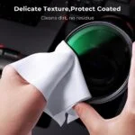 Cleaning a camera lens with a cloth, showing delicate texture and protection.