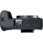 Bottom view of a camera body showcasing mount and grip, available at Camix UK.