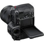 Professional mirrorless camera body with adjustable screen and lens, available at Camix UK.