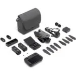 DJI drone with accessories including batteries, propellers, and carrying case.