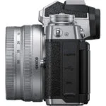 Side view of Nikon Z FC with DX 16-50mm VR lens, ideal for photography enthusiasts.