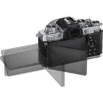 Nikon Z FC camera with DX 16-50mm VR lens, rear view showing adjustable screen.
