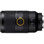 Sony E mount telephoto lens with focus and stabilization controls.