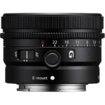 Sony E mount lens with aperture and focus controls, ideal for mirrorless cameras.