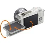 Sony mirrorless camera with tilting screen, ideal for vlogging and photography.