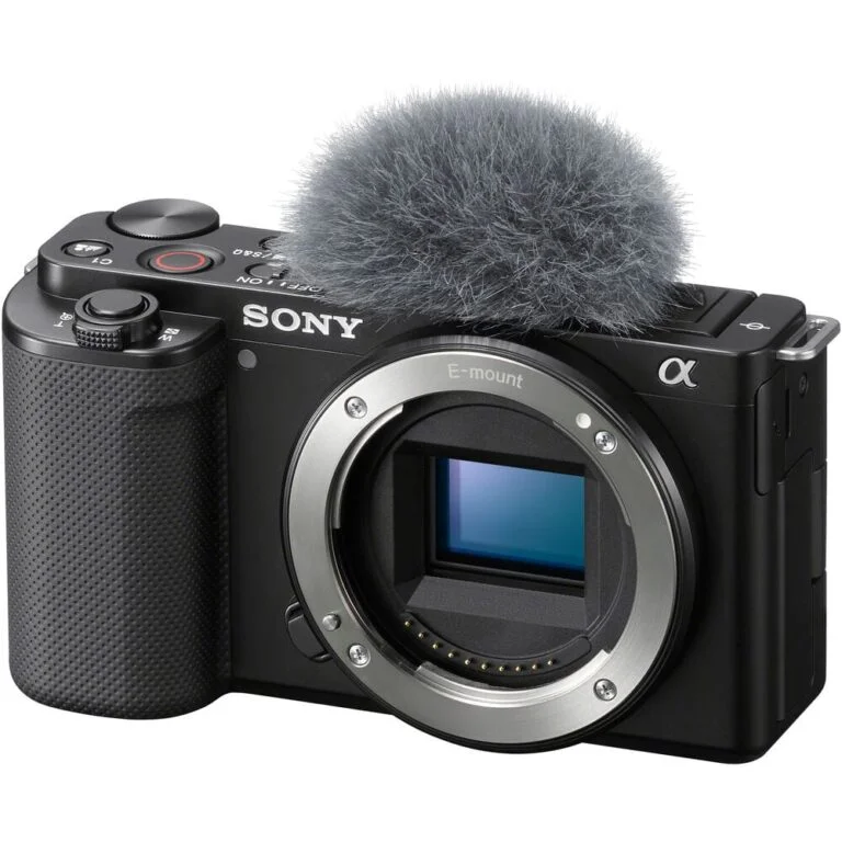 Sony mirrorless camera body with microphone, ideal for video and photography.