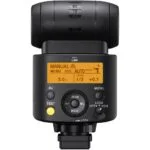 Professional camera flashgun with digital display for photography lighting.