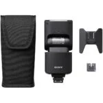 Sony camera flash with accessories and carrying case.